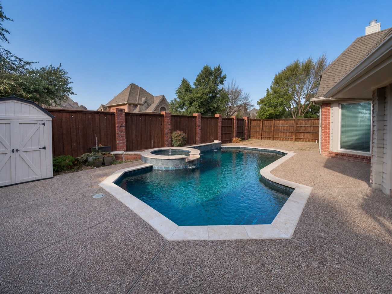 Raised spa and waterfall, octagon pool