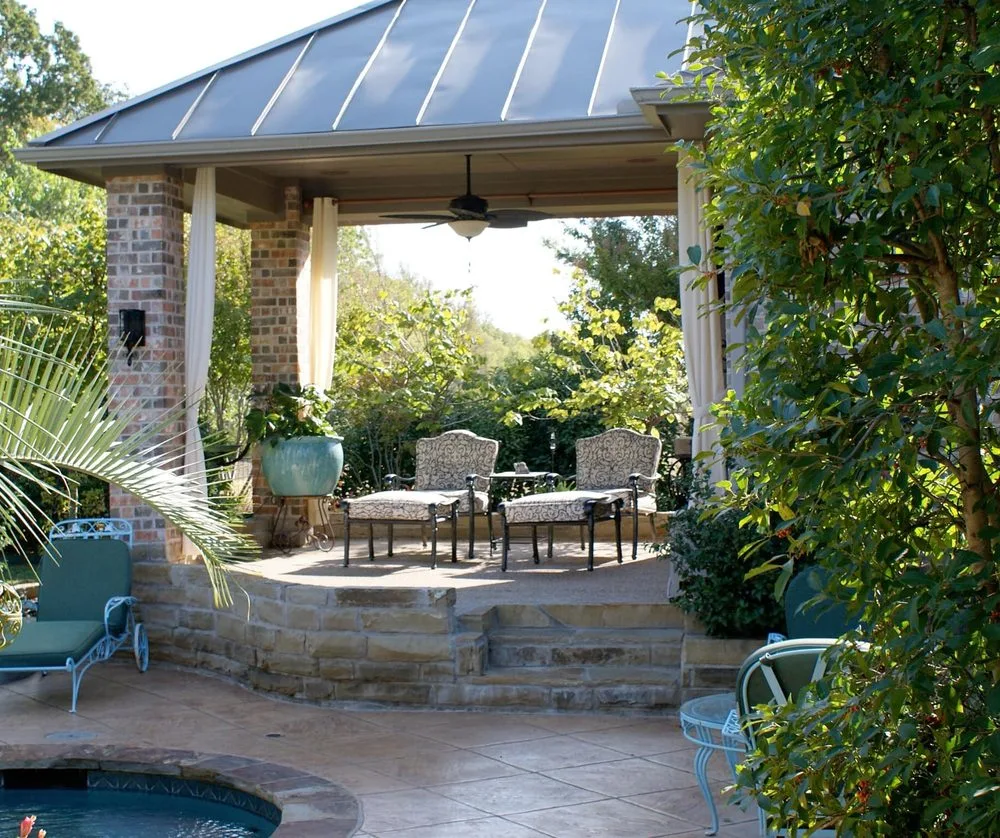 Covered raised patio and outdoor gathering space