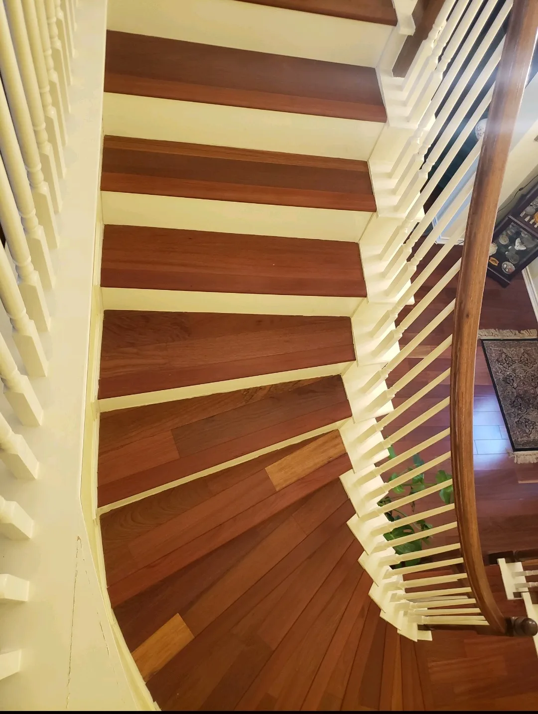 Hardwood stair and tread installation, curved staircase